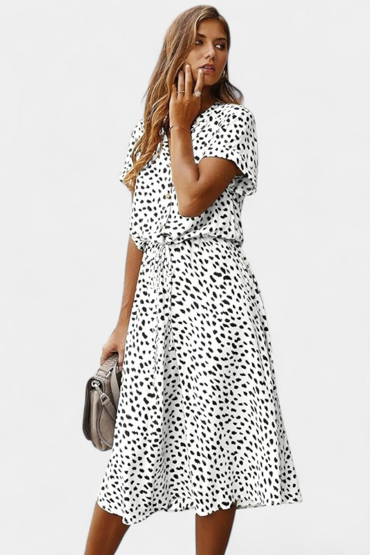 Vestido Midi de Lunares Rovena con Cuello Camisero y Cintura Ajustable