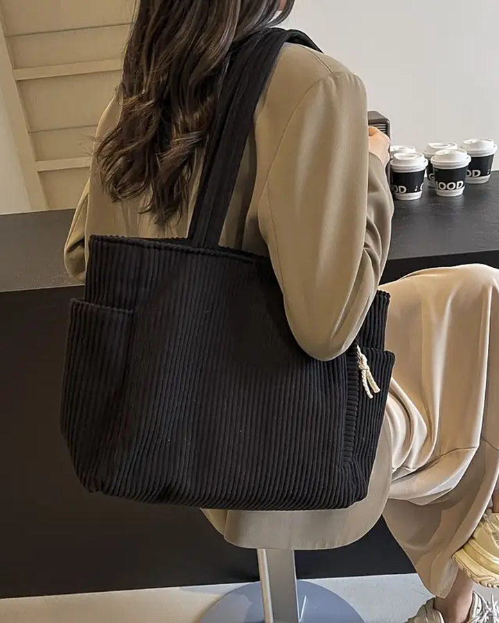 Tilda – Bolsa de hombro con diseño acanalado y detalle de cordón