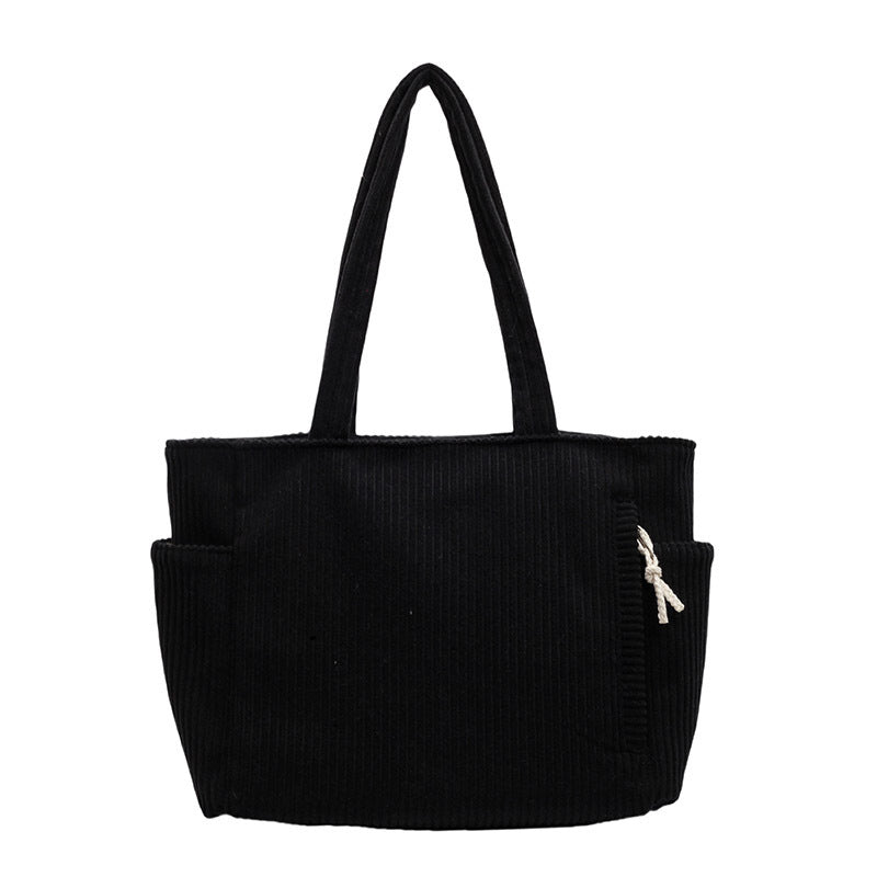 Tilda – Bolsa de hombro con diseño acanalado y detalle de cordón