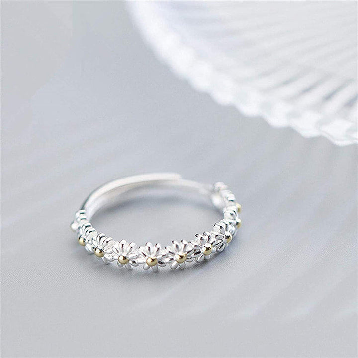 Anillo de plata ajustable con esmaltes pintados a mano y diseño de margaritas