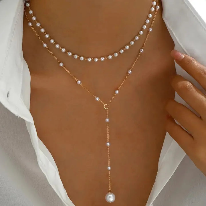 Collar de dos hileras de perlas con colgante