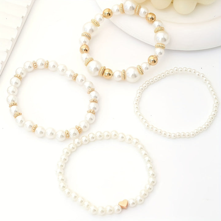 Juego de sofisticadas pulseras en forma de corazón adornadas con perlas