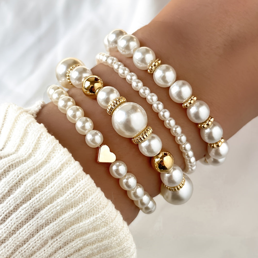Juego de sofisticadas pulseras en forma de corazón adornadas con perlas