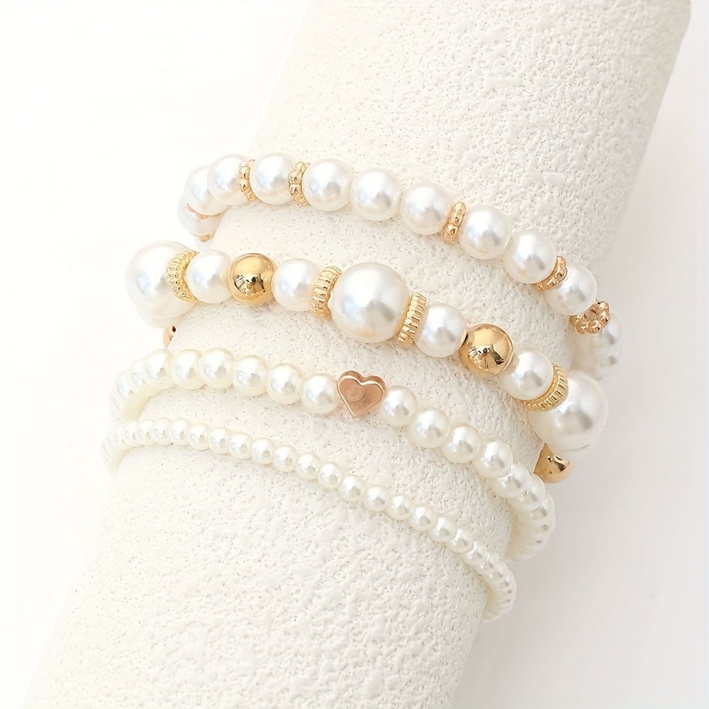 Juego de sofisticadas pulseras en forma de corazón adornadas con perlas