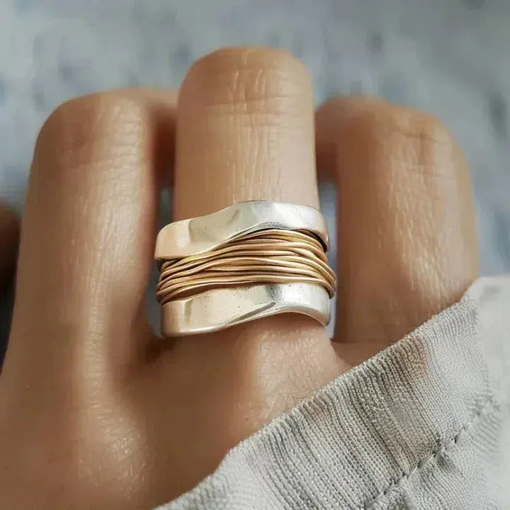 Anillo de plata con detalles en oro
