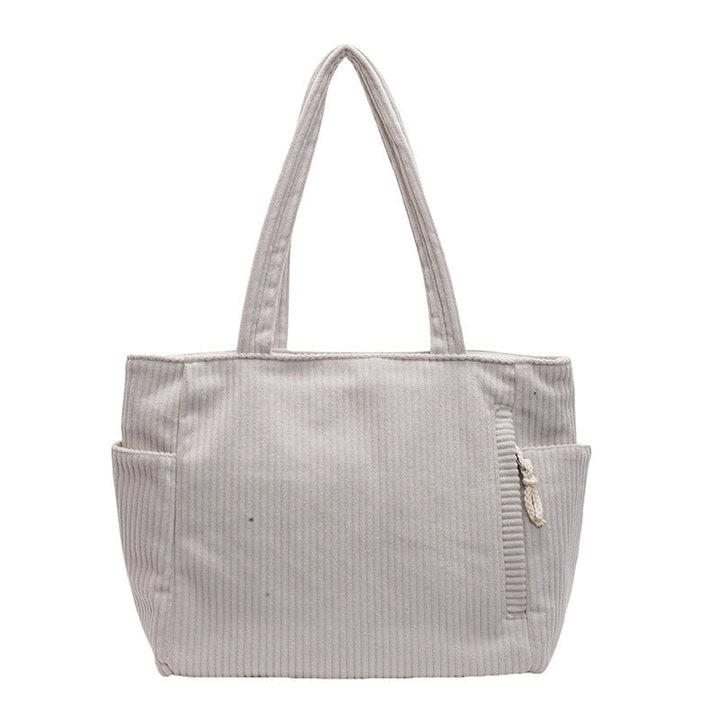 Tilda – Bolsa de hombro con diseño acanalado y detalle de cordón